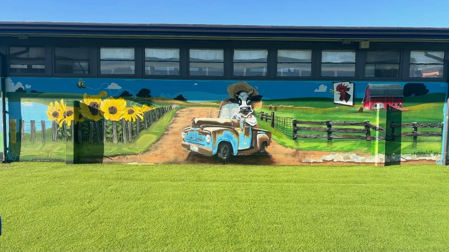 MAMMXTH baseball field mural with truck and landscape