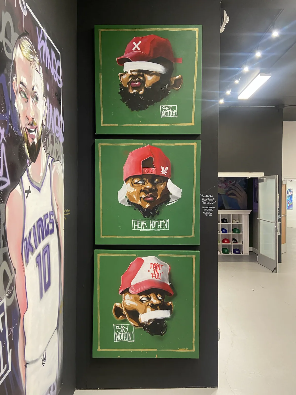 MAMMXTH portrait artwork displayed in a studio